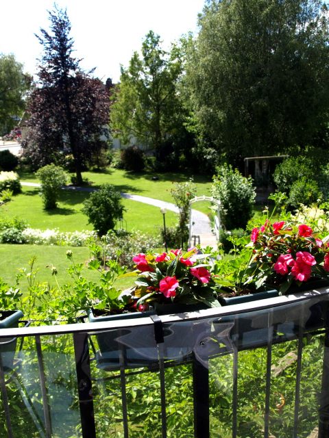 Haus de Paoli - Blick von Terrasse oben auf den Garten